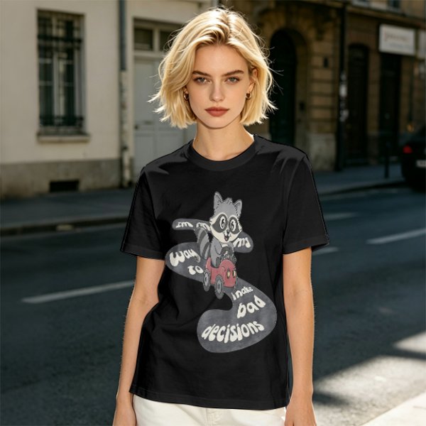 Olive graphic tee with raccoon driving car and 'Way to make bad decisions' text