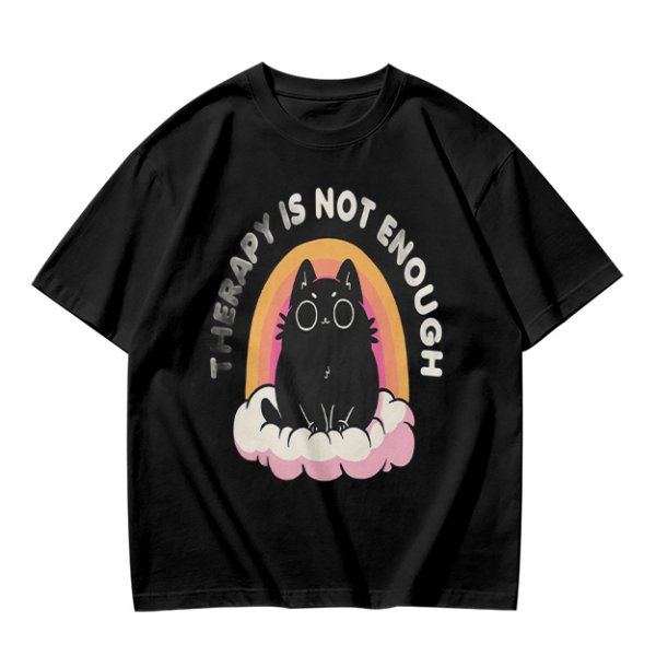 Olive graphic tee with black cat, rainbow, and 'Therapy Is Not Enough' text
