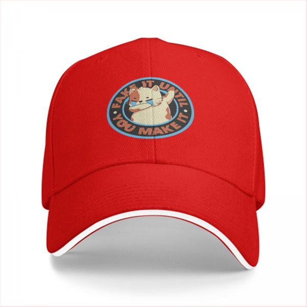 Black baseball cap with crying cat graphic and fake it until you make it text