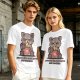 Olive t-shirt with a raccoon eating snacks and 'powered by pure spite and snackies' text