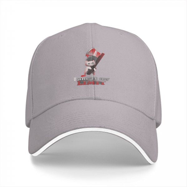 Black baseball cap with 'I am at my LIMIT' and cartoon character print