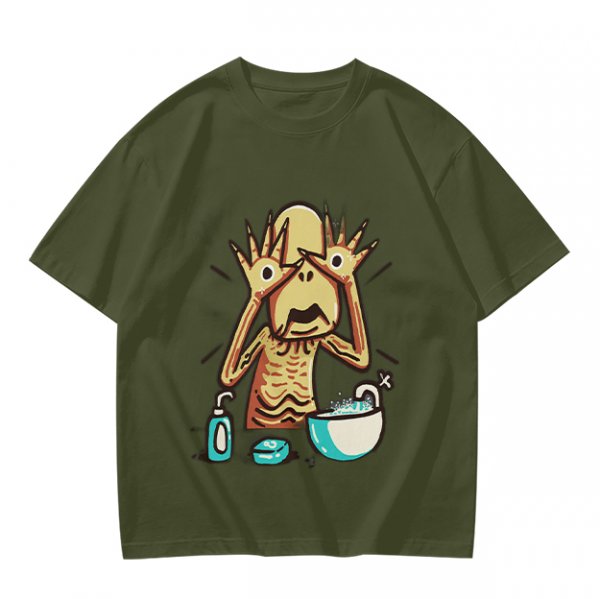 Olive T-shirt with a startled alien washing hands graphic