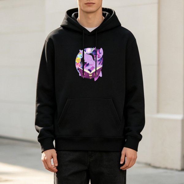 Black hoodie with purple unicorn reading magical book graphic