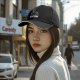 Black baseball cap with Jon Snow graphic and SNOW text