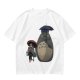 Olive T-shirt with Totoro and masked figure under umbrellas print