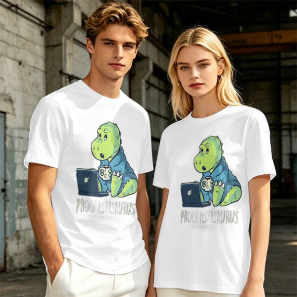 Olive t-shirt with a cartoon dinosaur working on laptop holding coffee
