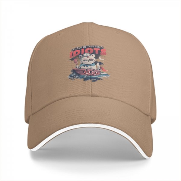 Black baseball cap with sailing cat graphic and 'Sailing in this sea of idiots' text