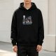Black hoodie with winter snow scene graphic of a round character with red scarf
