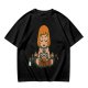 Olive T-shirt with cartoon muscular character meditating surrounded by candles