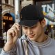 Black baseball cap with cute small animal graphic