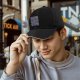 Black baseball cap with 'Mood of the Day' dragon emotion grid print