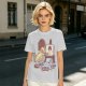 Olive T-Shirt Featuring a Bird Painting a Self-Portrait with an Afro