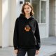 Black hoodie with cartoon devil on flames and skulls graphic