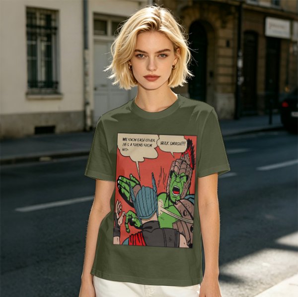 Olive t-shirt with comic print of Hulk and Thor mid-smashed interaction
