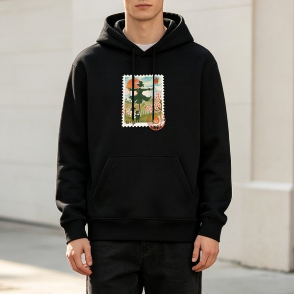 Black hoodie with whimsical stamp-style fantasy artwork print