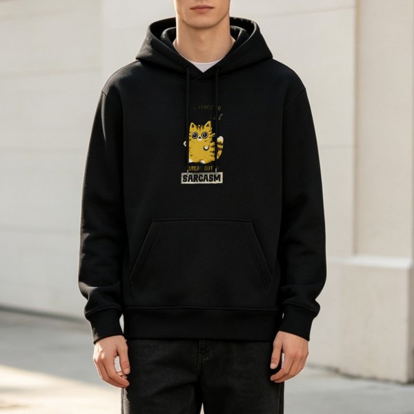 Black hoodie with a cartoon cat breaking out of sarcasm design
