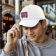 Black baseball cap with pink and purple bear graphic print