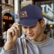 Black baseball cap with Halloween animal cupcake graphic design