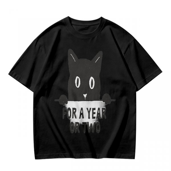 Olive graphic t-shirt with black cat holding 'for a year or two' text