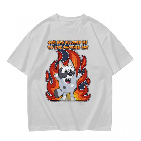 Olive t-shirt with cartoon dog and 'God has allowed me to live another day' print