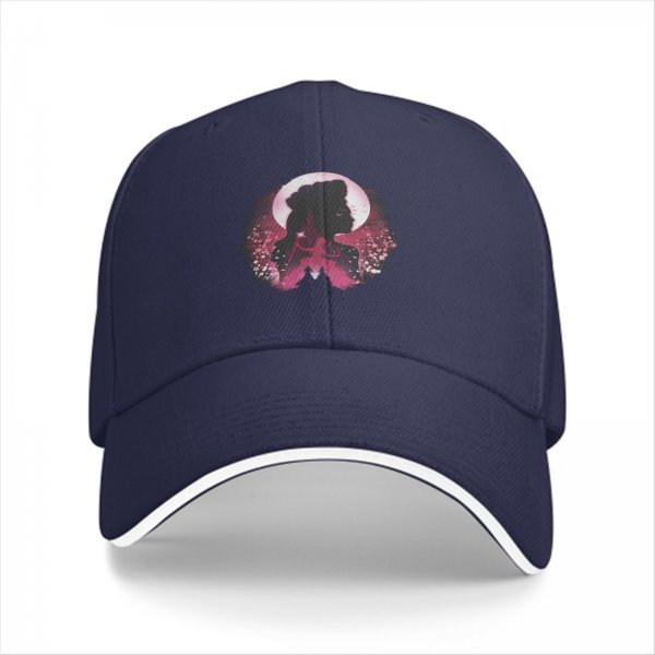 Black baseball cap with pink moon and princess silhouette graphic