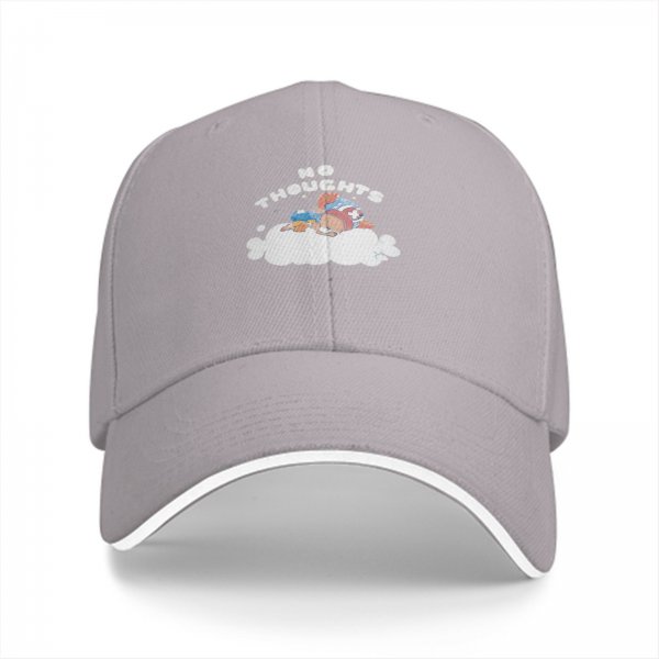 Black baseball cap with no thoughts sleeping character on cloud graphic