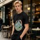 Olive T-shirt with Dancing Skeleton Mountain Rainbow Cat Graphic