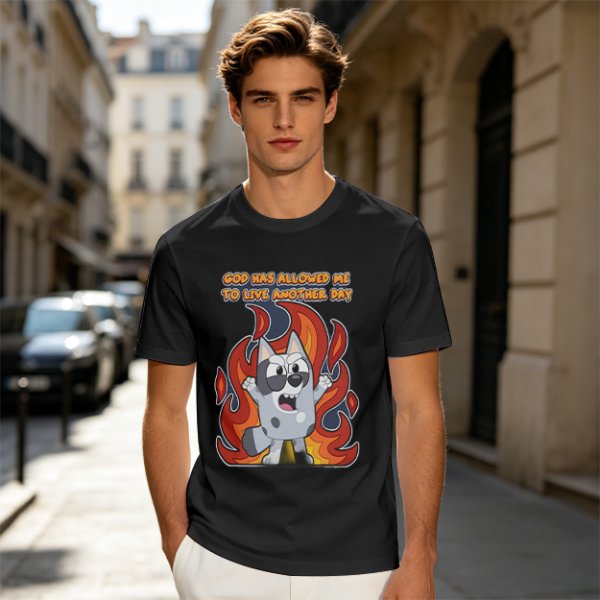 Olive t-shirt with cartoon dog and 'God has allowed me to live another day' print