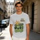 Olive green t-shirt with a cartoon dumpster on fire saying I'm a phoenix
