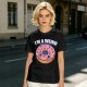 Olive green t-shirt with sad donut graphic and 'I'M A WEIRD' text