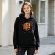 Black hoodie with anime character silhouette and sunset graphic
