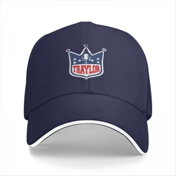 Black baseball cap with TRAYLOR crown shield logo and microphone design