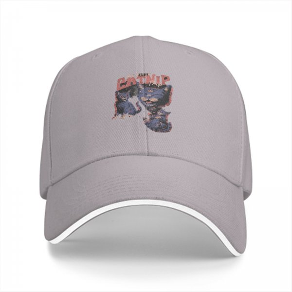 Black baseball cap with 'My First Catnip' and cat graphic print