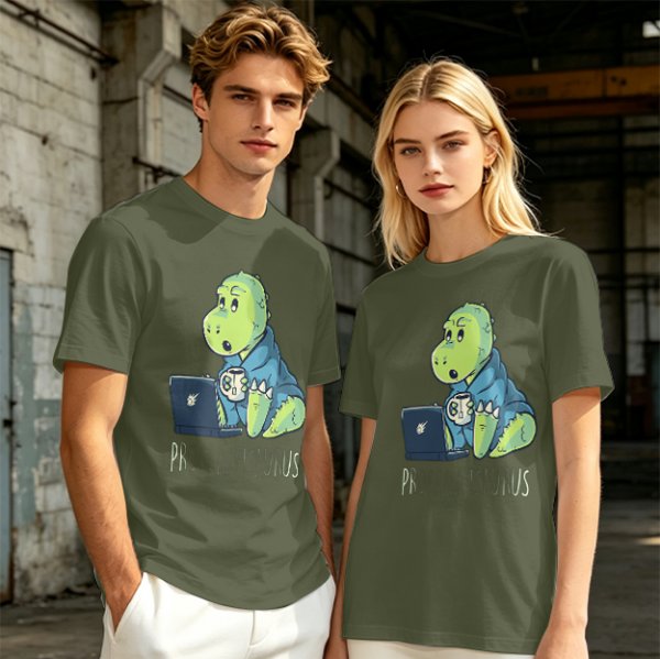 Olive t-shirt with a cartoon dinosaur working on laptop holding coffee