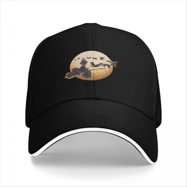 Black baseball cap with witch on broom silhouette against moon and birds