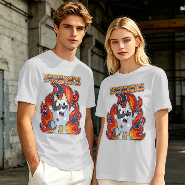 Olive t-shirt with cartoon dog and 'God has allowed me to live another day' print
