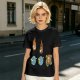 Olive Graphic Tee With Falling Cat Comets And Earth Artwork