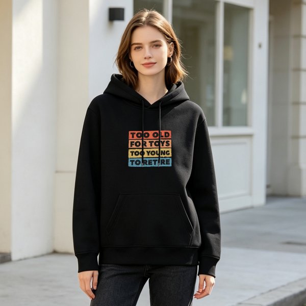 Black hoodie with 'Too Old For Toys Too Young To Retire' retro text print