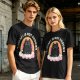 Olive graphic tee with black cat, rainbow, and 'Therapy Is Not Enough' text
