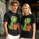 Olive green t-shirt with cute Tea Rex dinosaur holding a steaming tea mug
