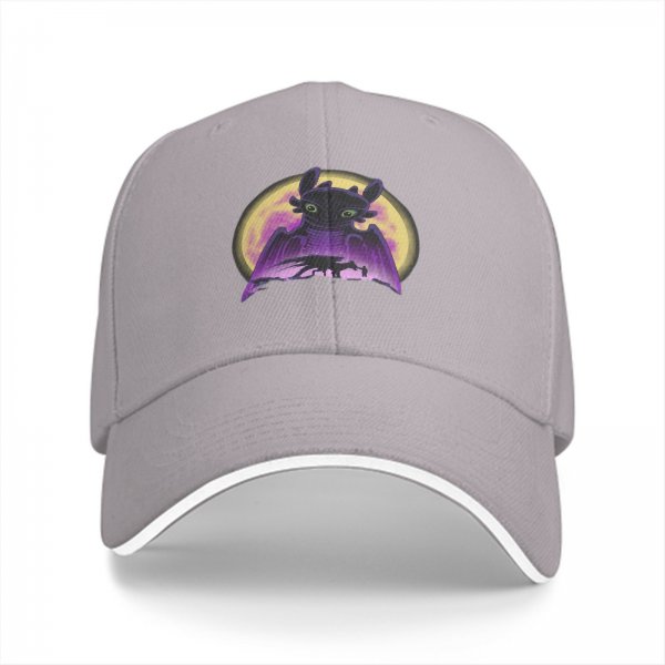 Black baseball cap featuring Toothless dragon and moon graphic