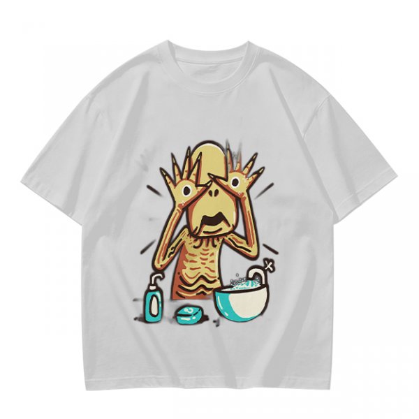 Olive T-shirt with a startled alien washing hands graphic