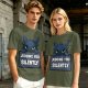 Olive t-shirt featuring Toothless the dragon judging you silently