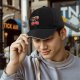 Black baseball cap with funny mood swing cherry graphic print