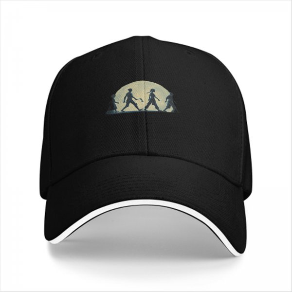 Black baseball cap with walking silhouettes against a moon backdrop