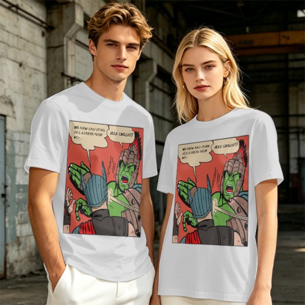 Olive t-shirt with comic print of Hulk and Thor mid-smashed interaction
