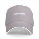 Black baseball cap with small text graphic on front panel