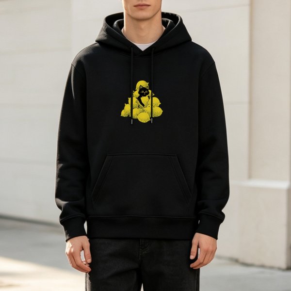 Black Hoodie With Black Cat Peeking From Pile Of Lemons