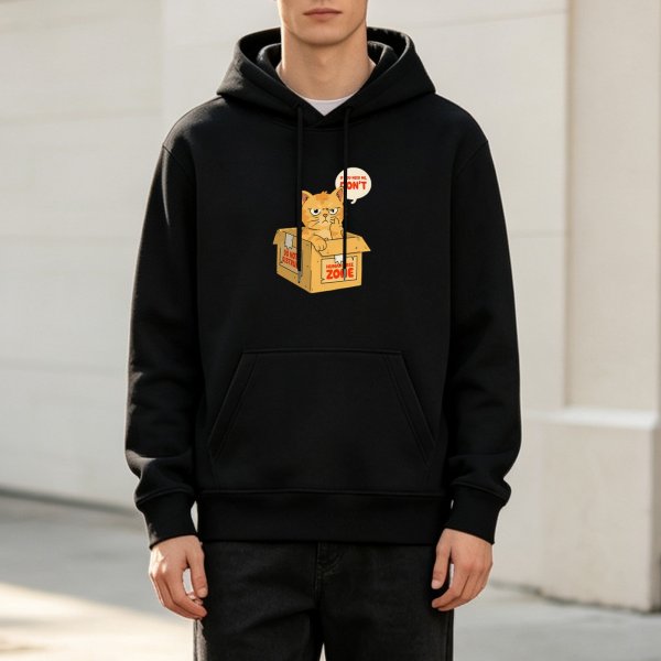 Black hoodie with grumpy orange cat in cardboard box funny print