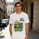 Olive green t-shirt with a cartoon dumpster on fire saying I'm a phoenix